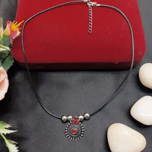 Filigree Pendant With Red Stones