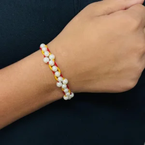 Gracefully Woven Pearl Rakhi