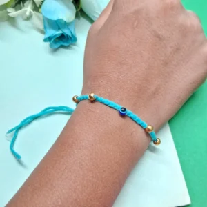 Blue Rakhi with Gold Bead & Evil Eye Charm
