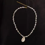 Coastal Beaded Necklace With Cowrie Shell Pendant