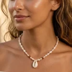 Coastal Beaded Necklace With Cowrie Shell Pendant