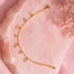 Gold-Tone Heart Charm Bracelet