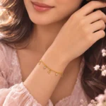 Gold-Tone Heart Charm Bracelet