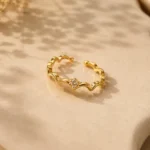 Stylish Gold-Tone Wavy CZ Ring for Women