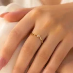 Stylish Gold-Tone Wavy CZ Ring for Women